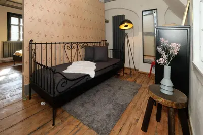 Ein Bett oder Betten in einem Zimmer der Unterkunft Renaissance Fachwerkhaus