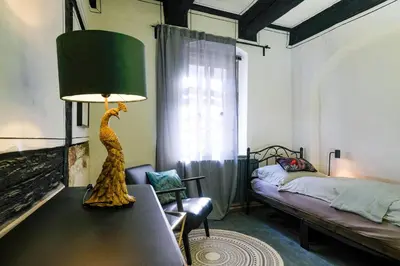 Ein Bett oder Betten in einem Zimmer der Unterkunft Renaissance Fachwerkhaus