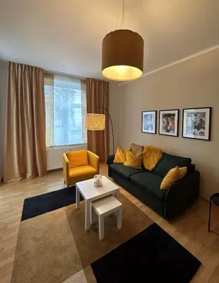 Ein Sitzbereich in der Unterkunft Victoria Apartment