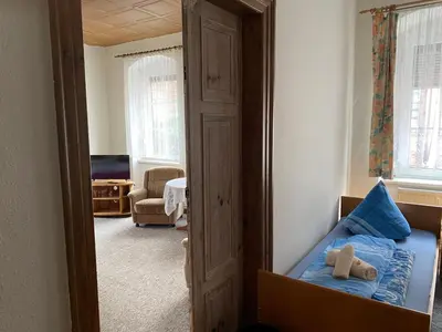 Ein Bett oder Betten in einem Zimmer der Unterkunft Hotel Stadt Leipzig