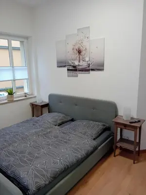 Ein Bett oder Betten in einem Zimmer der Unterkunft fambiwo - Top Ferienwohnung in sehr guter Lage