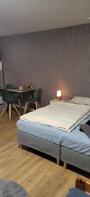 Ein Bett oder Betten in einem Zimmer der Unterkunft FeWo-Misterek nähe Großer Garten