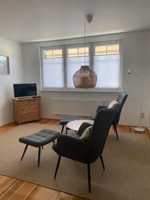 Ein Sitzbereich in der Unterkunft Ferienwohnung im Dreiseitenhof