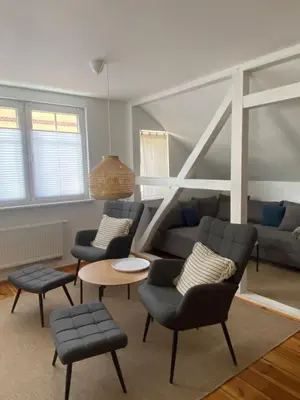 Ein Sitzbereich in der Unterkunft Ferienwohnung im Dreiseitenhof