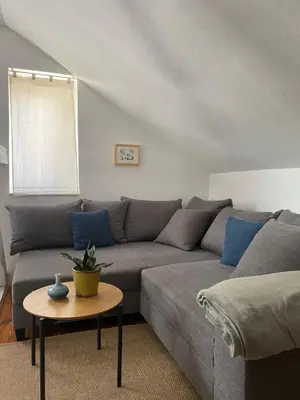Ein Sitzbereich in der Unterkunft Ferienwohnung im Dreiseitenhof