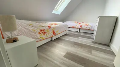 Ein Bett oder Betten in einem Zimmer der Unterkunft Ferienhaus Helfert FeWo2 mit eigener Terrasse