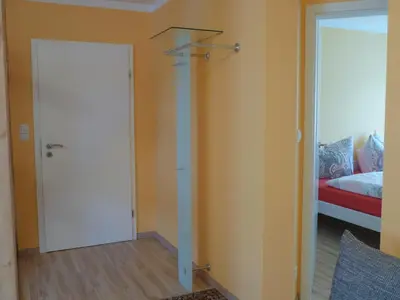 Ein Bett oder Betten in einem Zimmer der Unterkunft Ferienwohnung Am Lindenbaum