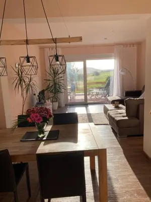 Ein Sitzbereich in der Unterkunft Landhaus Böhmer, Ferienhaus Schrammsteinblick