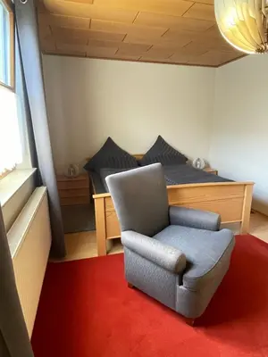 Ein Sitzbereich in der Unterkunft Ferienwohnung Schneider