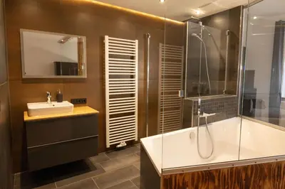 Ein Badezimmer in der Unterkunft Loft Apartment mit großer Badewanne B
