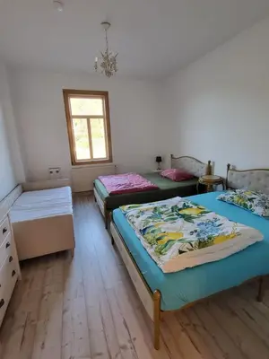 Ein Bett oder Betten in einem Zimmer der Unterkunft Lilienstein