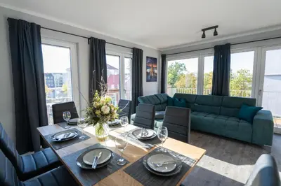 Ein Sitzbereich in der Unterkunft Supreme City Dream mit Terrasse und Parkplatz - 110m²