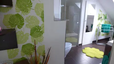 Ein Bett oder Betten in einem Zimmer der Unterkunft Fewo Schimpf Pirna
