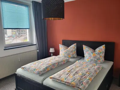 Ein Bett oder Betten in einem Zimmer der Unterkunft Apartment - Gästewohnung - Unterkunft Monteure