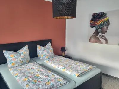 Ein Bett oder Betten in einem Zimmer der Unterkunft Apartment - Gästewohnung - Unterkunft Monteure