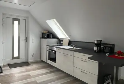 Küche/Küchenzeile in der Unterkunft Ferienhaus Helfert Fewo DG mit Terrasse