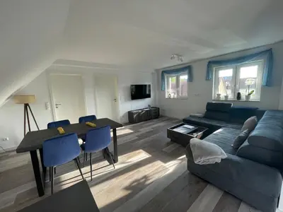 Ein Sitzbereich in der Unterkunft Ferienhaus Helfert Fewo DG mit Terrasse