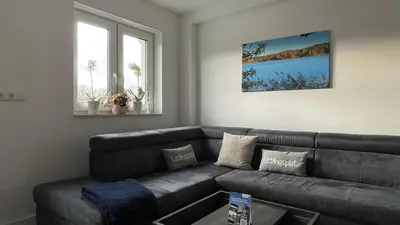 Ein Sitzbereich in der Unterkunft Ferienhaus Helfert Fewo DG mit Terrasse