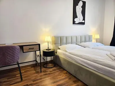 Ein Bett oder Betten in einem Zimmer der Unterkunft Zentrales 2 Raum Apartment