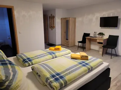 Ein Bett oder Betten in einem Zimmer der Unterkunft Kulturstätte Gröditz