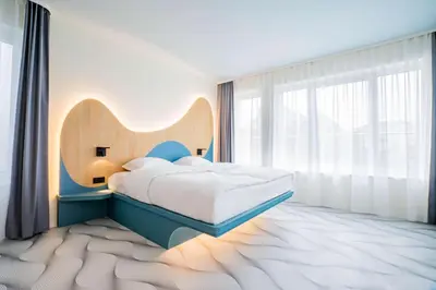 Ein Bett oder Betten in einem Zimmer der Unterkunft Prize by Radisson, Dresden Mitte
