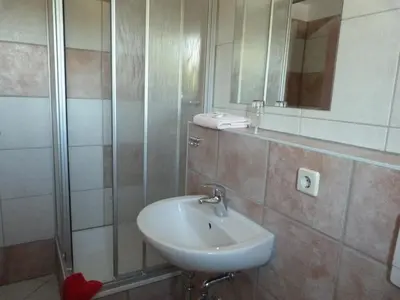 Ein Badezimmer in der Unterkunft Waldhaus Colditz Garni