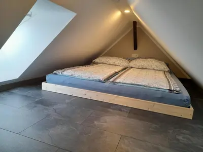 Ein Bett oder Betten in einem Zimmer der Unterkunft Ferienwohnung am Kalten Bach