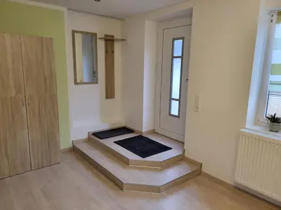 Ein Bett oder Betten in einem Zimmer der Unterkunft Ferienwohnung am Wald