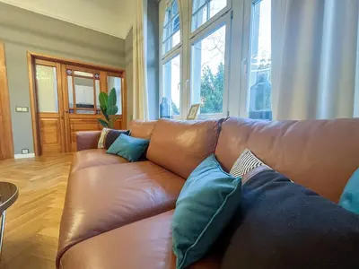 Ein Sitzbereich in der Unterkunft Wohnperle*GroßerGarten*Villa