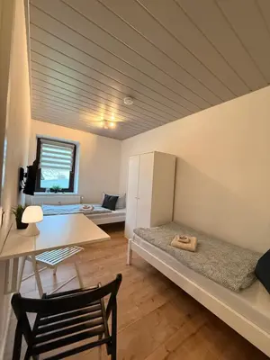 Ein Bett oder Betten in einem Zimmer der Unterkunft Mikro Apartment Großenhain