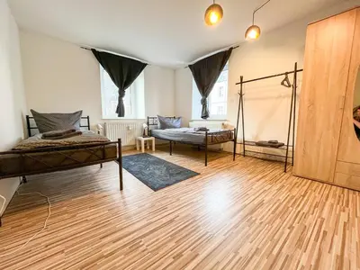 Ein Bett oder Betten in einem Zimmer der Unterkunft MonteurWohnung Wilsdruff - App 1