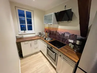 Küche/Küchenzeile in der Unterkunft Ferienwohnung Kohlbornsteinblick am Malerweg