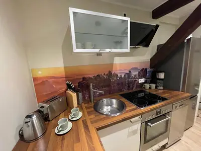 Küche/Küchenzeile in der Unterkunft Ferienwohnung Kohlbornsteinblick am Malerweg