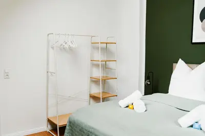 Ein Bett oder Betten in einem Zimmer der Unterkunft Ferienwohnung Elbzauber für 6 l Parkplatz l Balkon