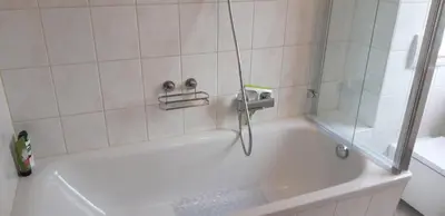 Ein Badezimmer in der Unterkunft Ferienwohnung Bärensteinblick