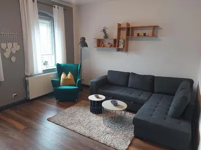 Ein Sitzbereich in der Unterkunft Ferienwohnung am Windberg