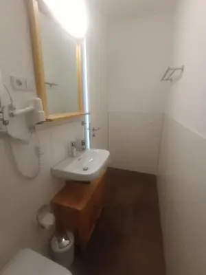 Ein Badezimmer in der Unterkunft Ferienwohnung an der Brauerei Mittelndorf