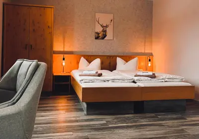 Ein Bett oder Betten in einem Zimmer der Unterkunft Pension Sonnenschein