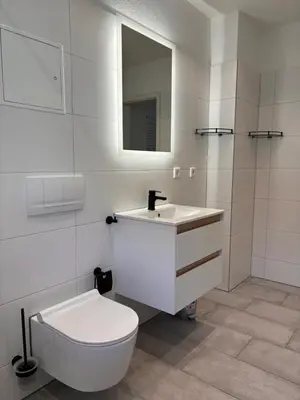 Ein Badezimmer in der Unterkunft Ferienwohnung Freital-City