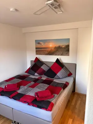 Ein Bett oder Betten in einem Zimmer der Unterkunft Ferienwohnung Freital-City