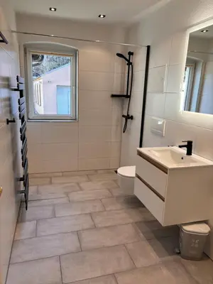 Ein Badezimmer in der Unterkunft Ferienwohnung Freital-City