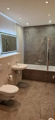 Ein Badezimmer in der Unterkunft Ferienwohnungen SATKULA