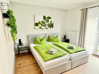 Ein Bett oder Betten in einem Zimmer der Unterkunft ElbOase - Radfahrer willkommen!