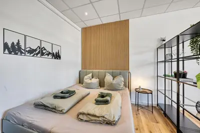 Ein Bett oder Betten in einem Zimmer der Unterkunft Dresden City Apartment, zentral & ruhig
