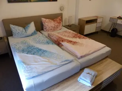 Ein Bett oder Betten in einem Zimmer der Unterkunft Ferienwohnung in 09548 Seiffen bis maximal 18 Personen
