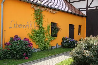 Ein Garten an der Unterkunft Pension Zumpe