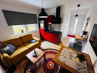 Ein Sitzbereich in der Unterkunft Fischis Ferienwohnung Struppen