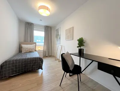 Ein Bett oder Betten in einem Zimmer der Unterkunft Luxury 3 Room Chemnitz