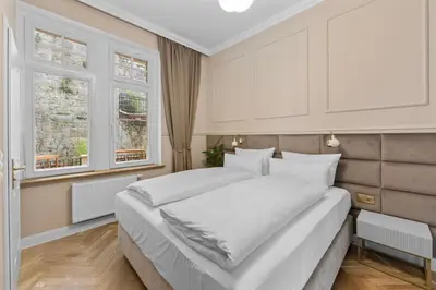 Ein Bett oder Betten in einem Zimmer der Unterkunft Residenz Hugo