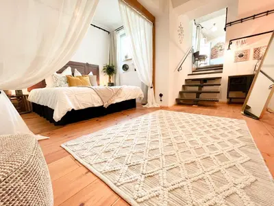 Ein Bett oder Betten in einem Zimmer der Unterkunft Cozy Art Experience: The quiet & relaxing escape